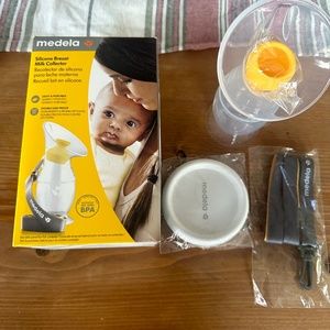 Two medela milk collectors new